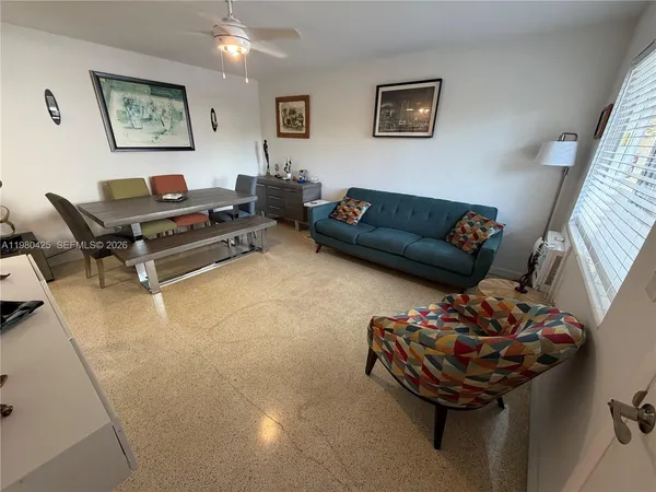 a living room with furniture and a couch