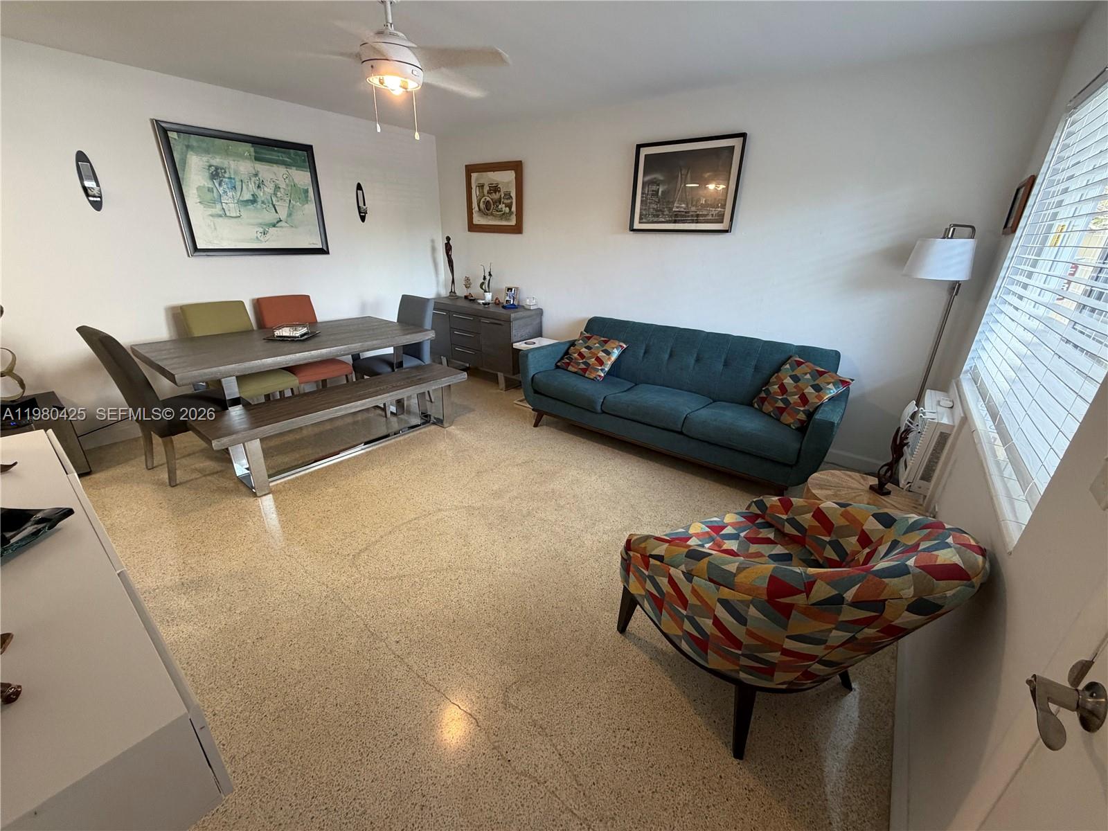 3055 Southwest 1st Avenue, Unit 201 Miami, FL 33129 - Photo 2 of 9 a living room with furniture and a couch
