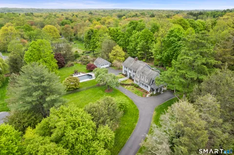 a aerial view of residential houses with outdoor space