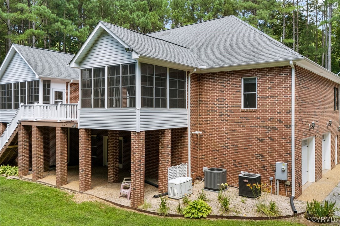 12102 Colemans Lake Road Ford, VA 23850 - Photo 46 of 50 a front view of a house with garden