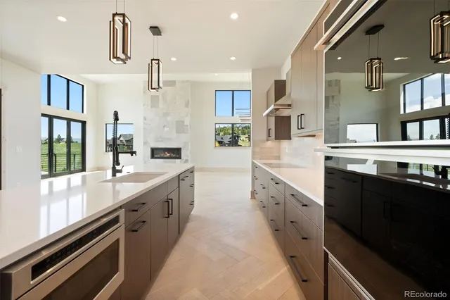 an empty room with mirror in hallway