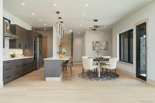 an empty room with a fireplace and window