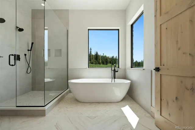 a picture of a bathroom with a bathtub