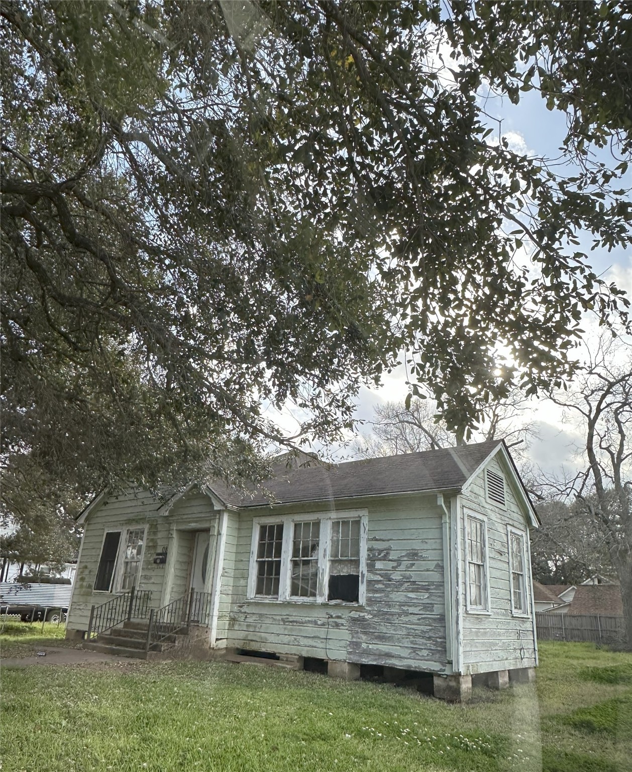 1108 MacArthur Street Rosenberg, TX 77471 - Photo 1 of 9 a front view of a house with a garden