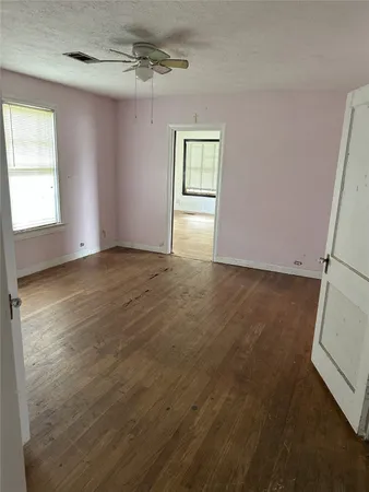 an empty room with windows