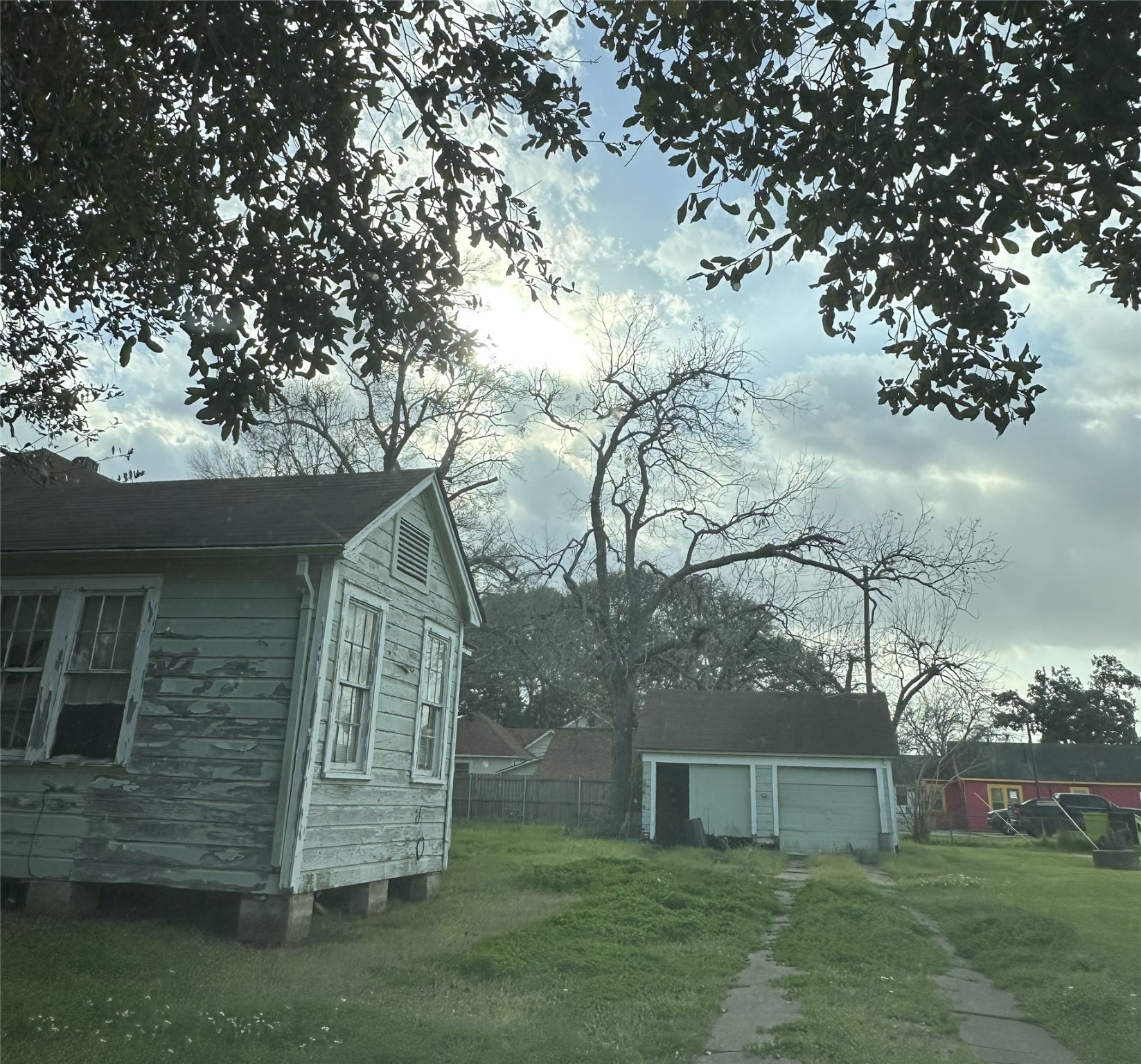 1108 MacArthur Street Rosenberg, TX 77471 - Photo 9 of 9 a backyard of a house with lots of green space