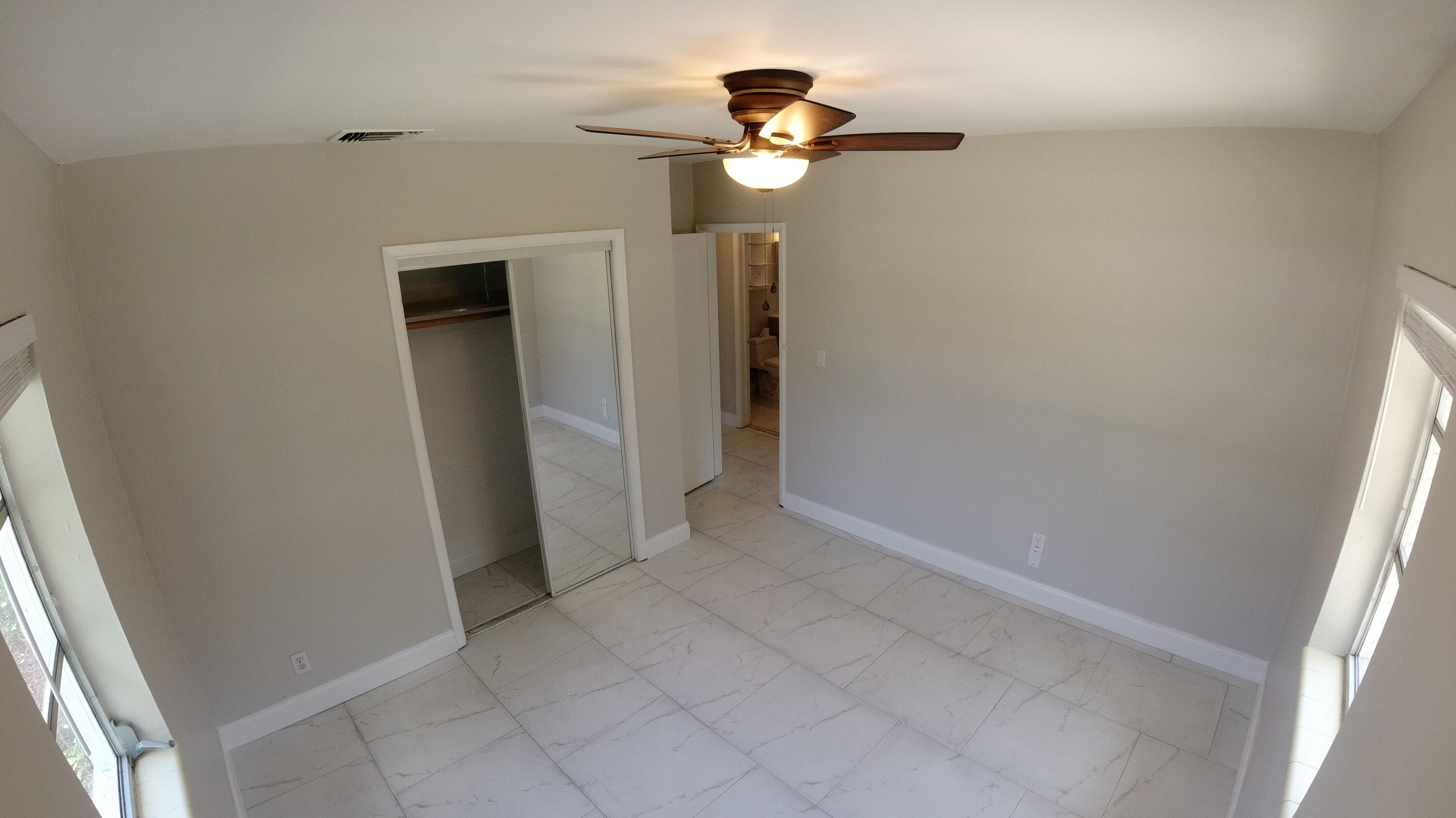 2119 Northridge Road Delray Beach, FL 33444 - Photo 10 of 12 an empty room with a window