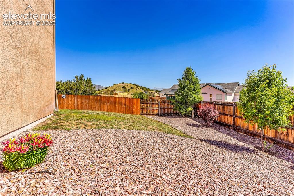 415 Empire Road Canon City, CO 81212 - Photo 39 of 40 a front view of a house with a yard