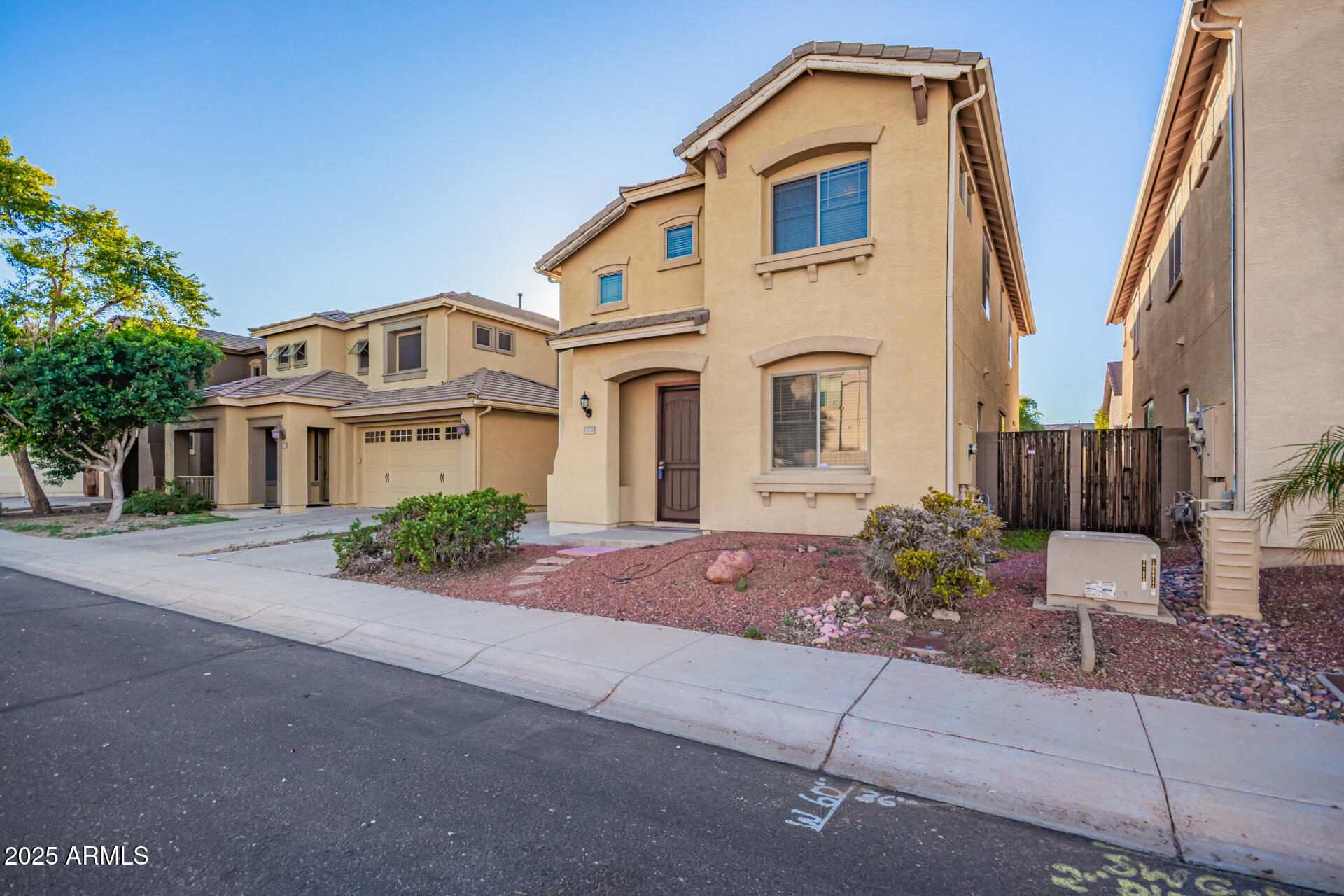 15170 North 145th Lane Surprise, AZ 85379 - Photo 5 of 40 a front view of a house with a yard
