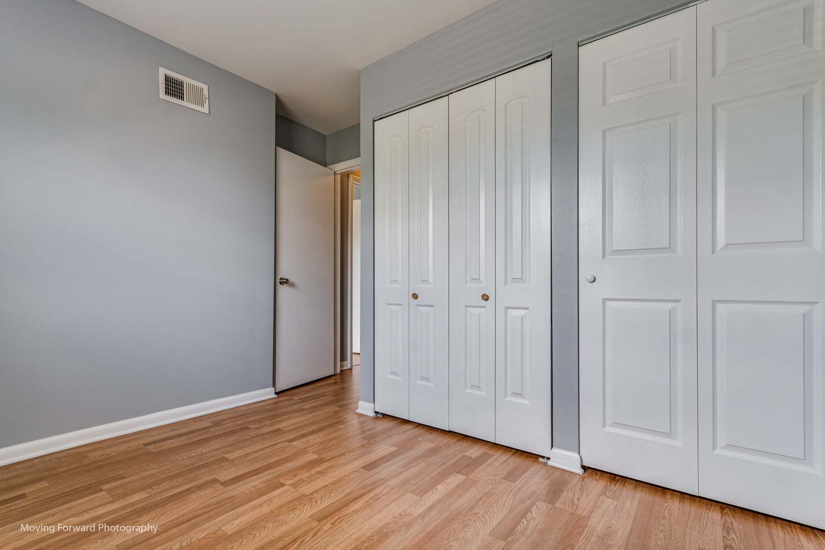 1234 Elder Court, Unit 1234 Wheeling, IL 60090 - Photo 16 of 24 a view of an empty room with wooden floor