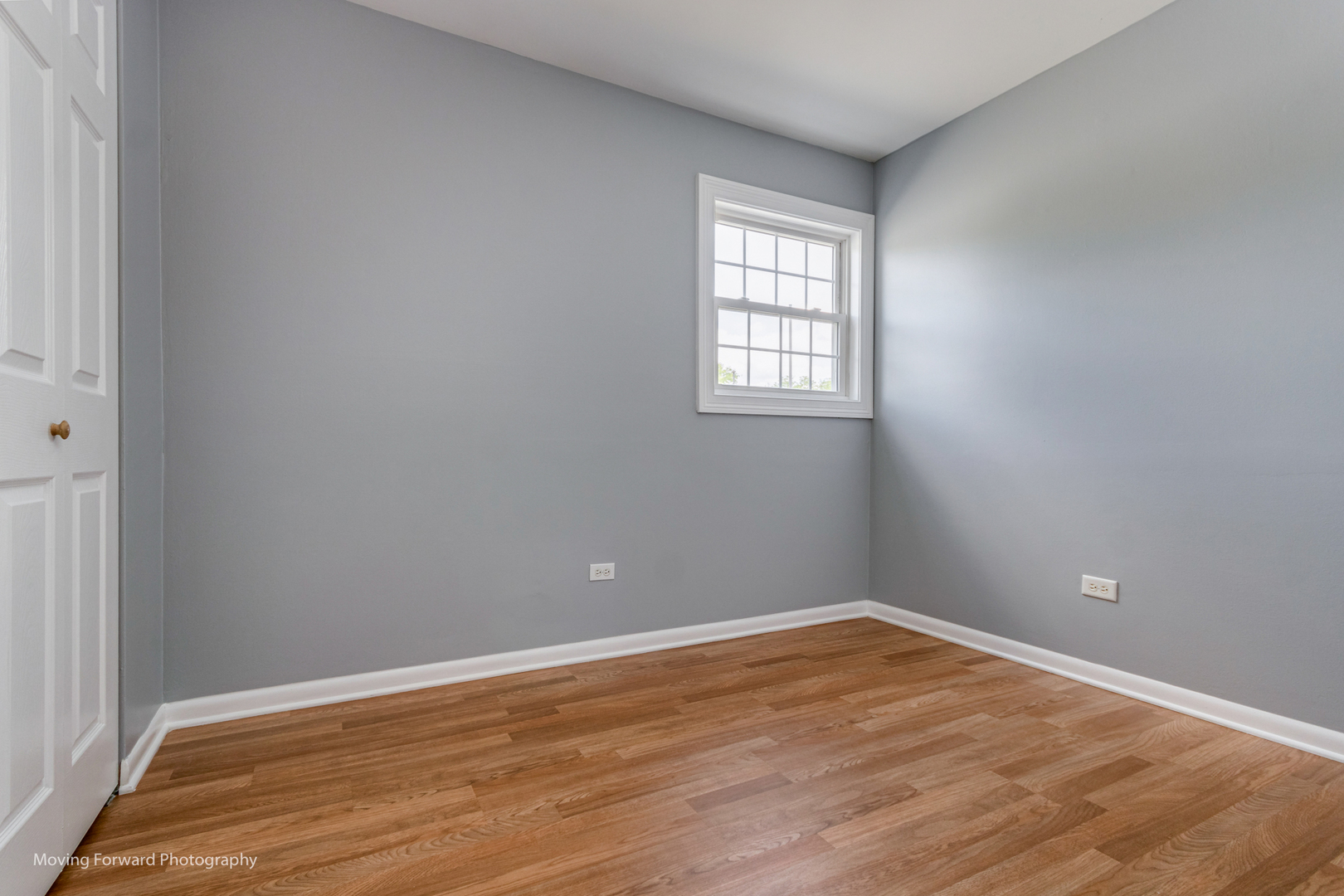 1234 Elder Court, Unit 1234 Wheeling, IL 60090 - Photo 17 of 24 an empty room with wooden floor and windows