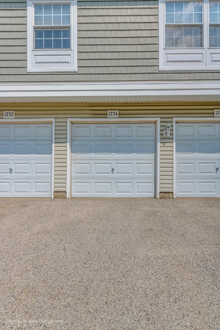 1234 Elder Court, Unit 1234 Wheeling, IL 60090 - Photo 2 of 24 a view of garage and window