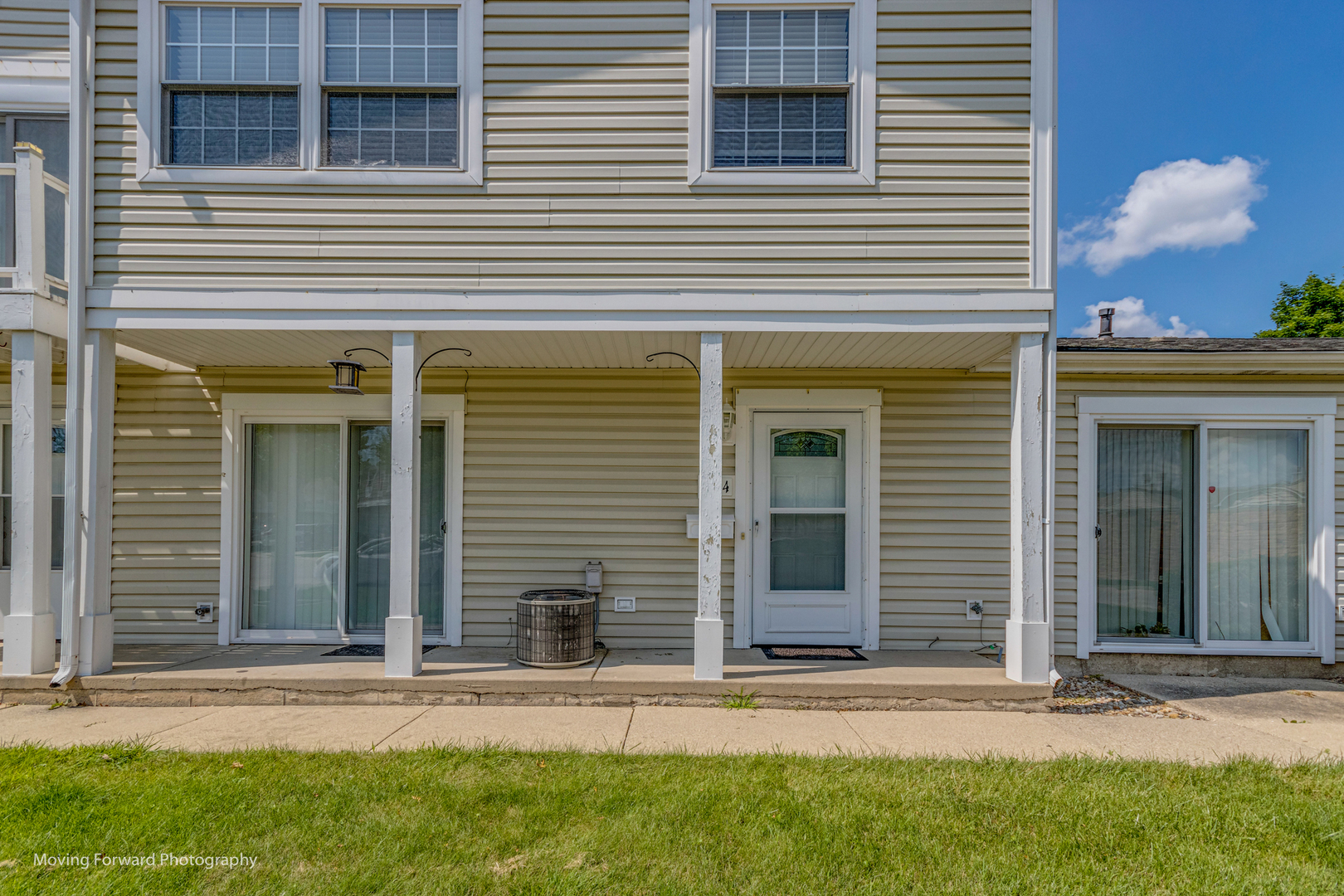 1234 Elder Court, Unit 1234 Wheeling, IL 60090 - Photo 3 of 24 a view of a house with a yard and a large window