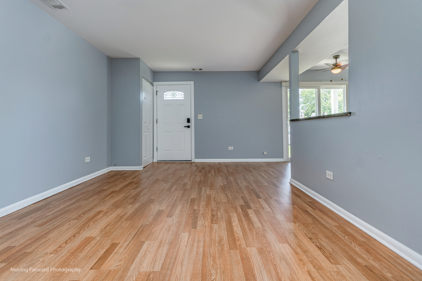 1234 Elder Court, Unit 1234 Wheeling, IL 60090 - Photo 5 of 24 a view of a room with wooden floor and window