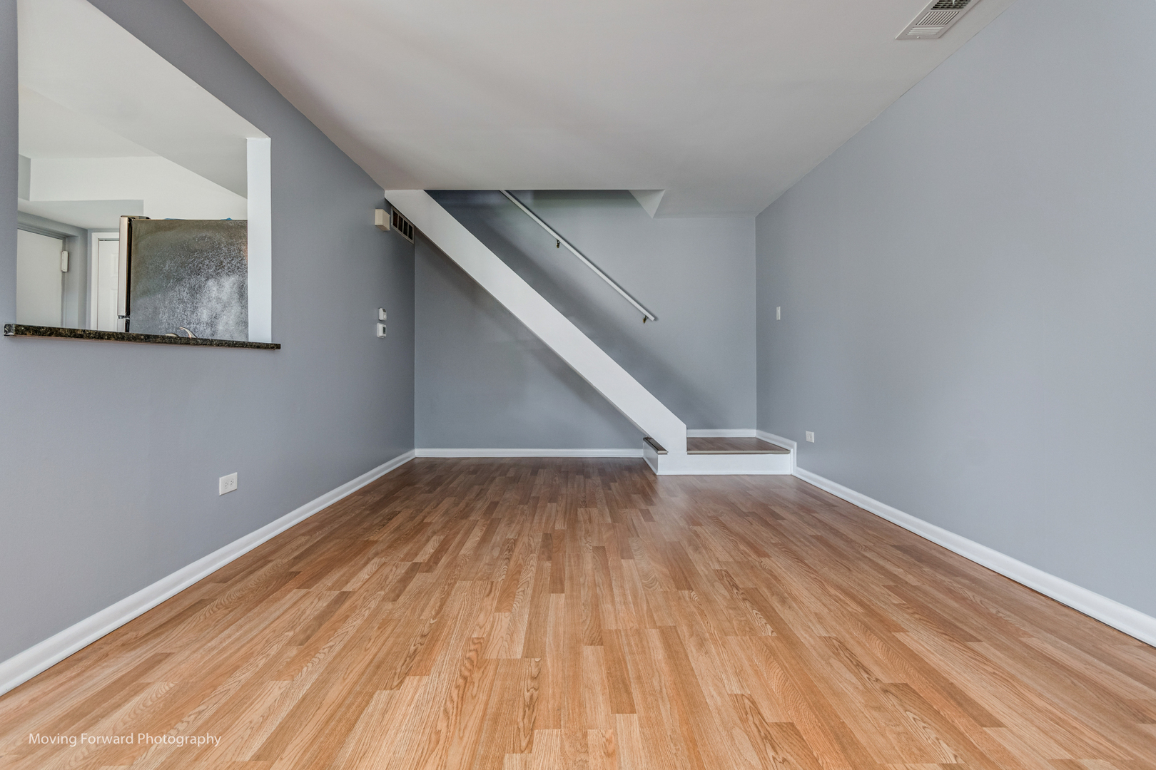 1234 Elder Court, Unit 1234 Wheeling, IL 60090 - Photo 7 of 24 a view of empty room with wooden floor