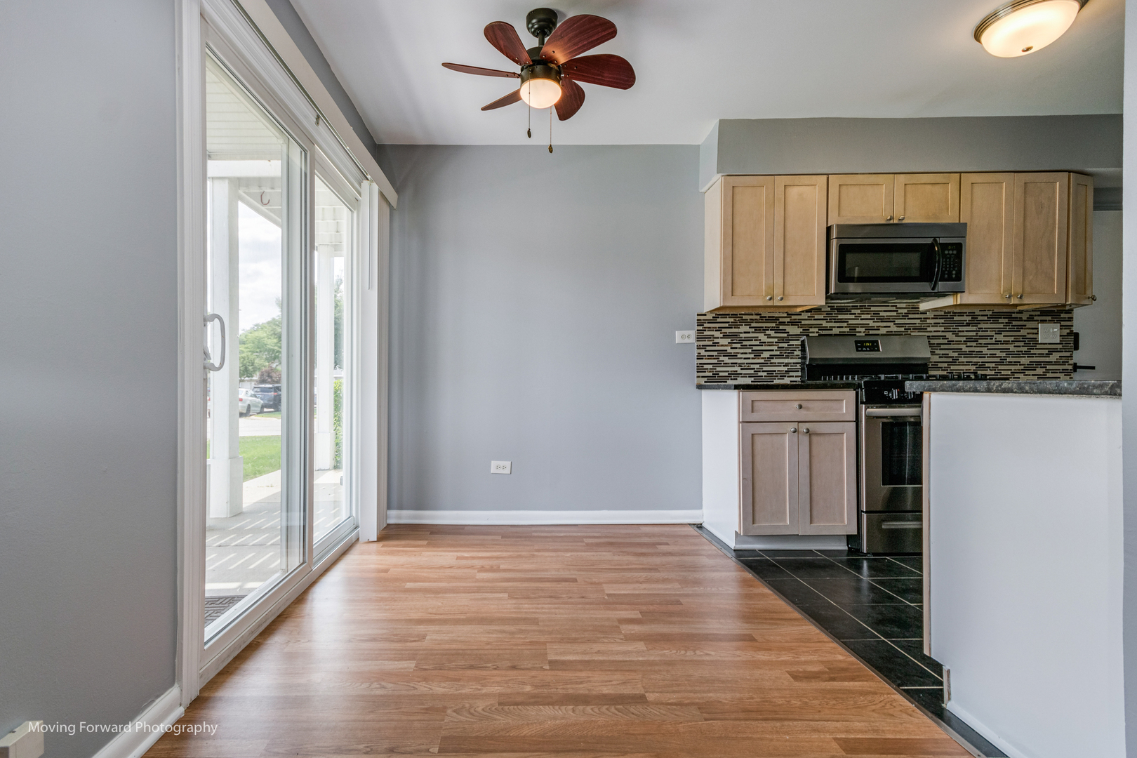 1234 Elder Court, Unit 1234 Wheeling, IL 60090 - Photo 8 of 24 a kitchen with stainless steel appliances granite countertop a stove and a refrigerator