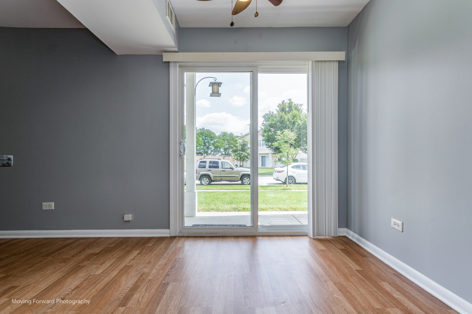 1234 Elder Court, Unit 1234 Wheeling, IL 60090 - Photo 9 of 24 a view of an empty room with wooden floor and a window
