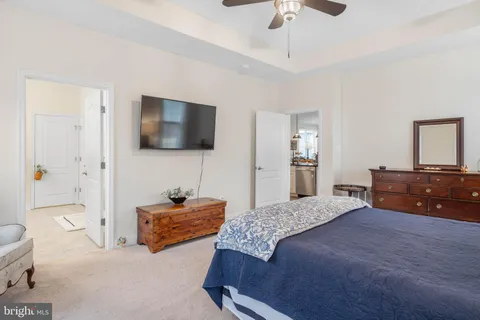 a bathroom with a shower and a glass door