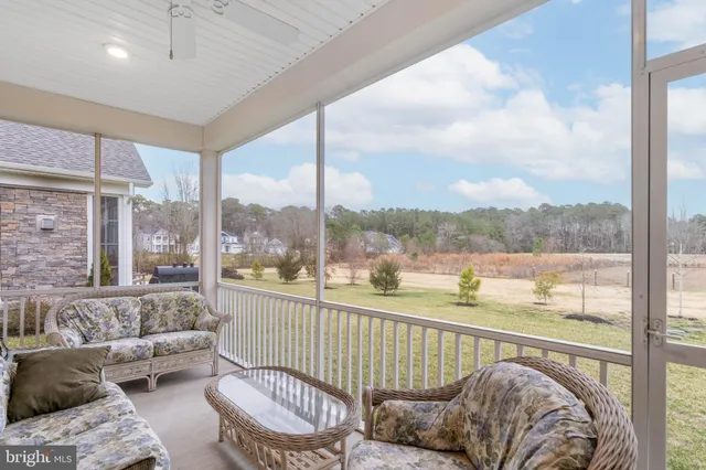 an aerial view of a house with a swimming pool