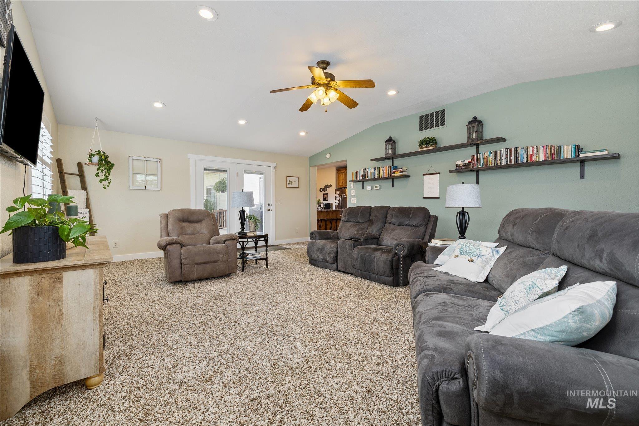 1140 Edgemont Road Emmett, ID 83617 - Photo 9 of 50 Spacious living area featuring neutral carpeting, recessed lighting, and a ceiling fan