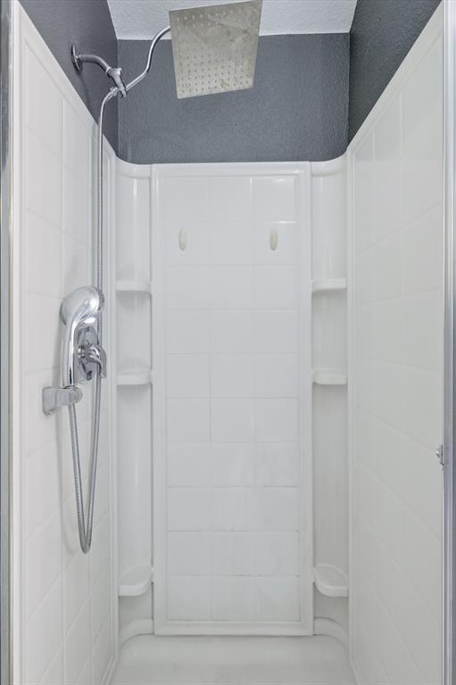 1201 Roping Reins Way Fort Worth, TX 76052 - Photo 23 of 34 a bathroom with a shower