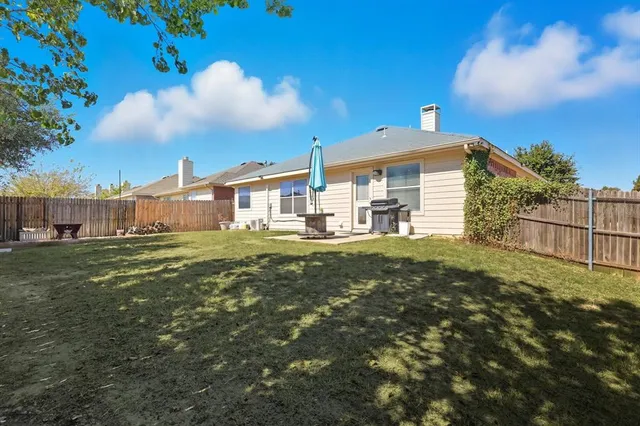 a house view with a garden space
