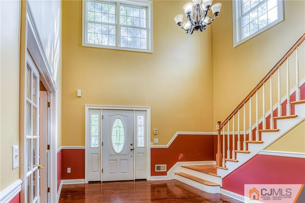85 Davidson's Mill Road North Brunswick, NJ 08902 - Photo 24 of 39 a view of front door with wooden floor