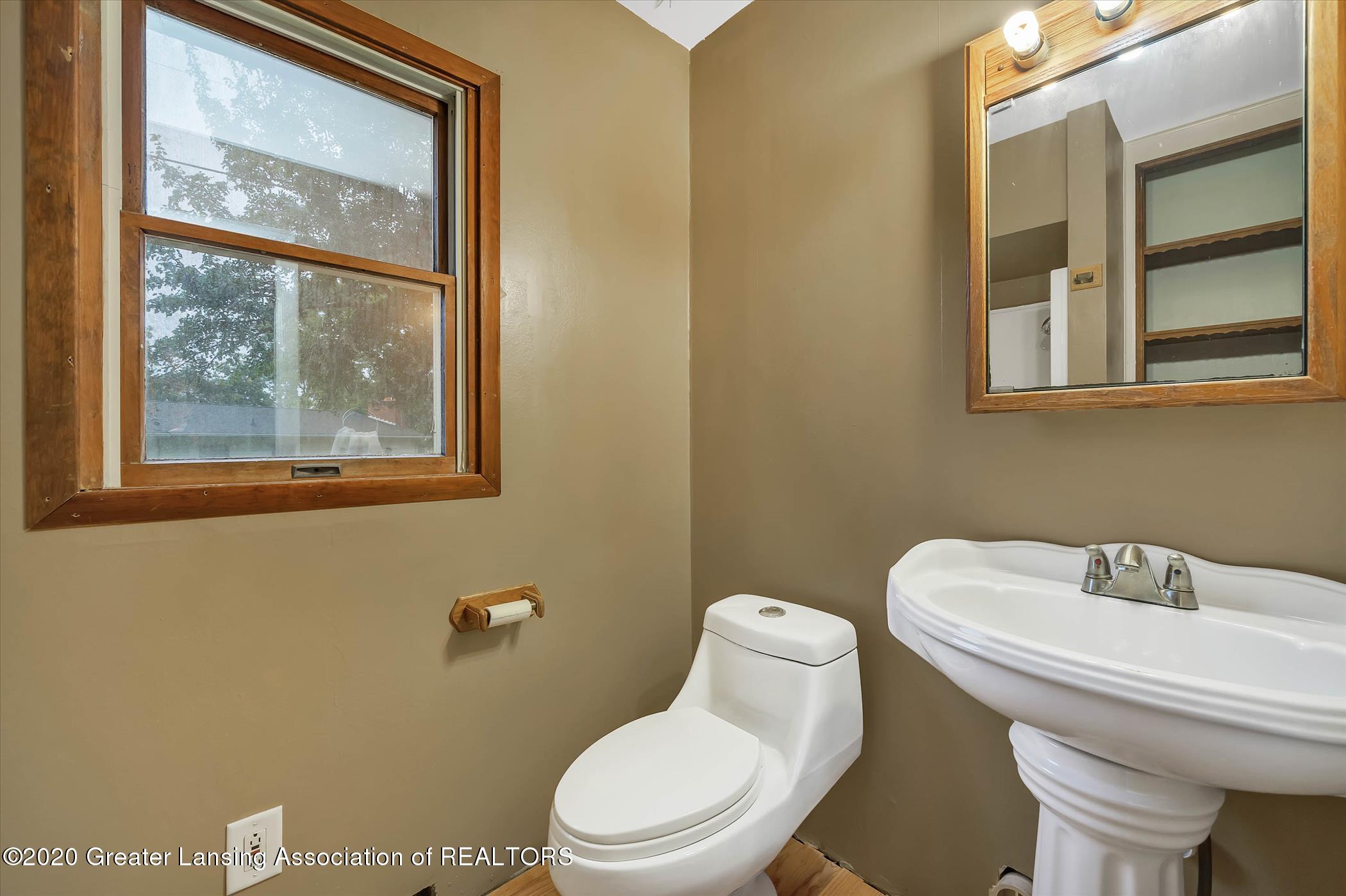2173 Iroquois Road Okemos, MI 48864 - Photo 19 of 41 2173 Iroquois Rd-WindowStill-Rea (28)