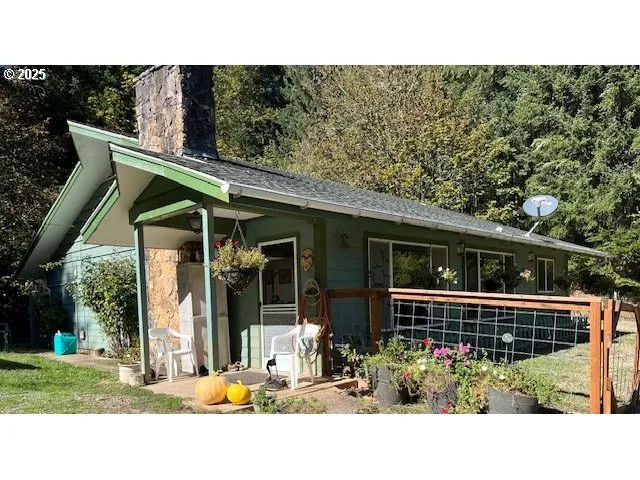 a black and white photo of a house