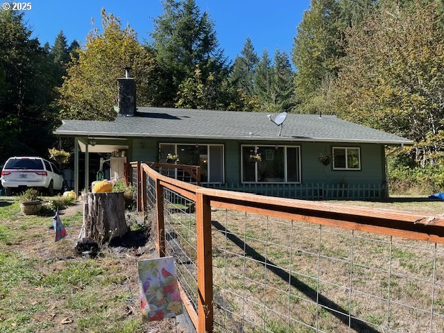 78544 Rat Creek Road Cottage Grove, OR 97424 - Photo 2 of 44 a view of a house with roof and sitting area
