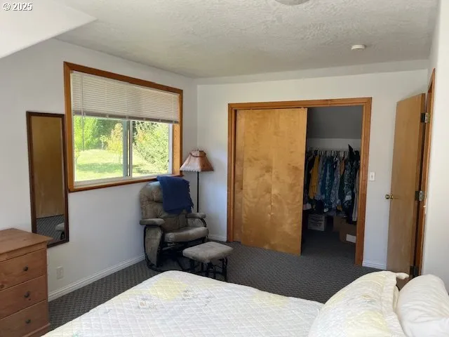 a view of livingroom with furniture and windows