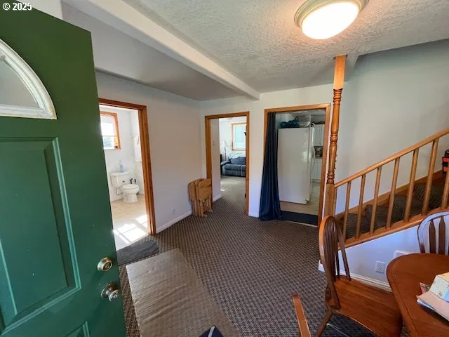 a aerial view of a house with a yard