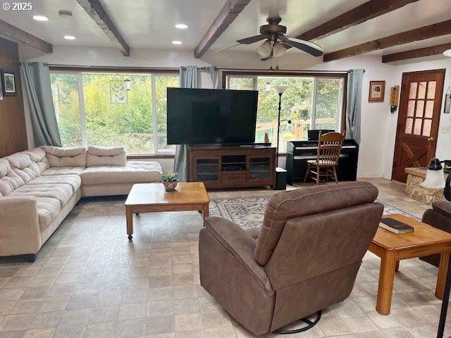 78544 Rat Creek Road Cottage Grove, OR 97424 - Photo 3 of 44 a living room with furniture and a flat screen tv