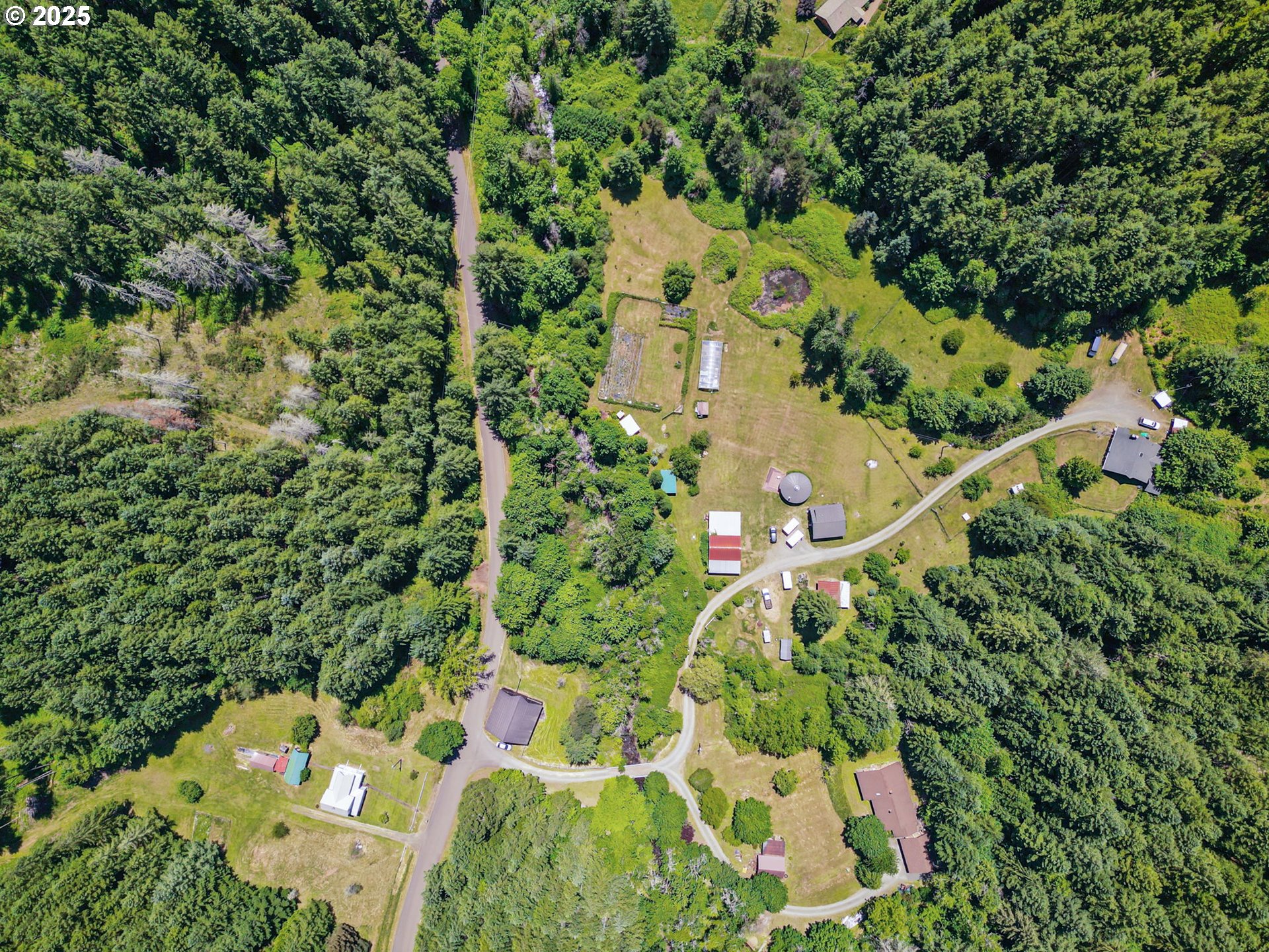 78544 Rat Creek Road Cottage Grove, OR 97424 - Photo 44 of 44 an aerial view of a residential houses