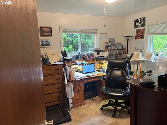 78544 Rat Creek Road Cottage Grove, OR 97424 - Photo 9 of 44 a view of a workspace with furniture and a window