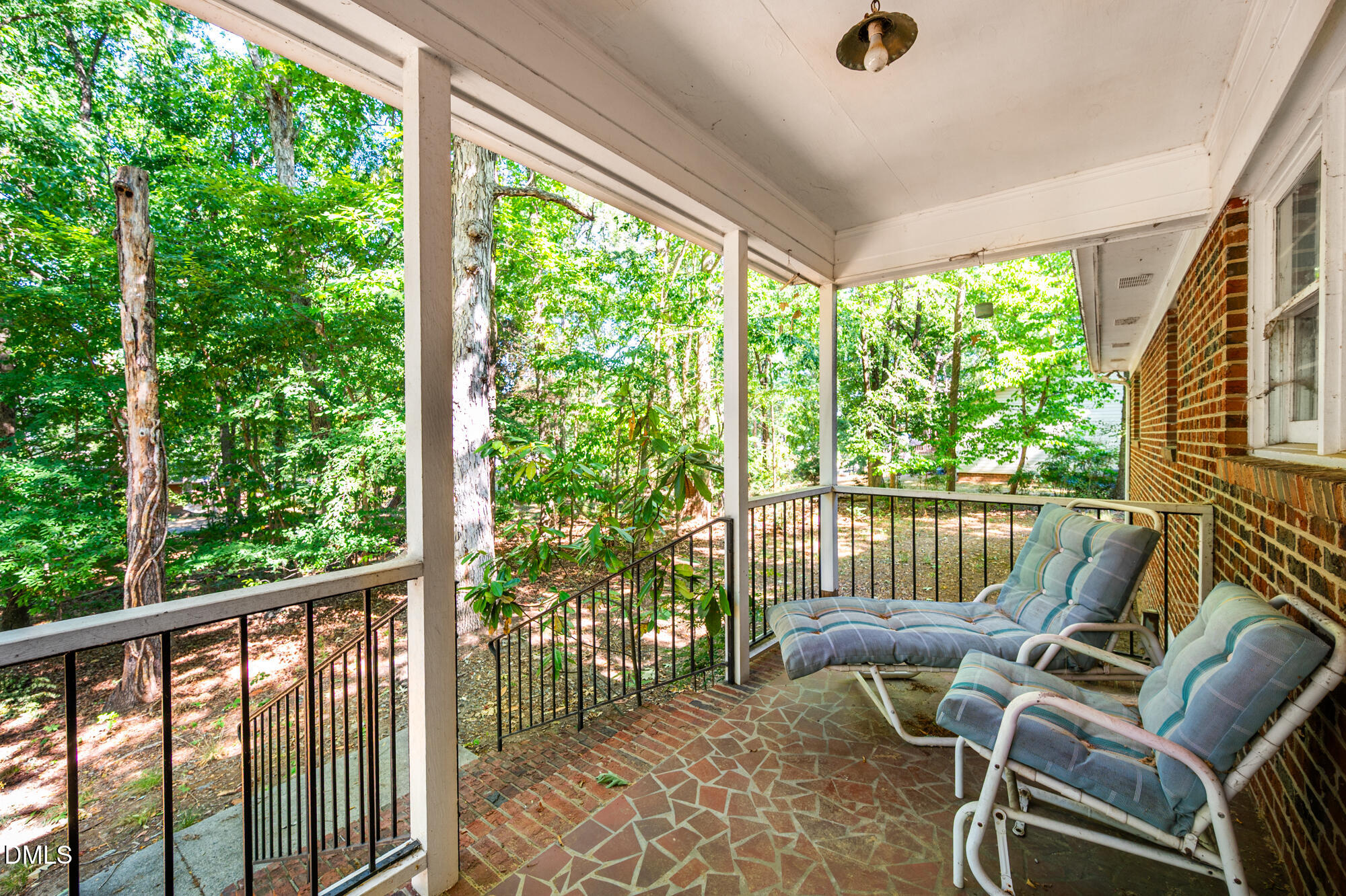 4411 Rhew Drive Durham, NC 27704 - Photo 28 of 34 a view of a two chair in the balcony