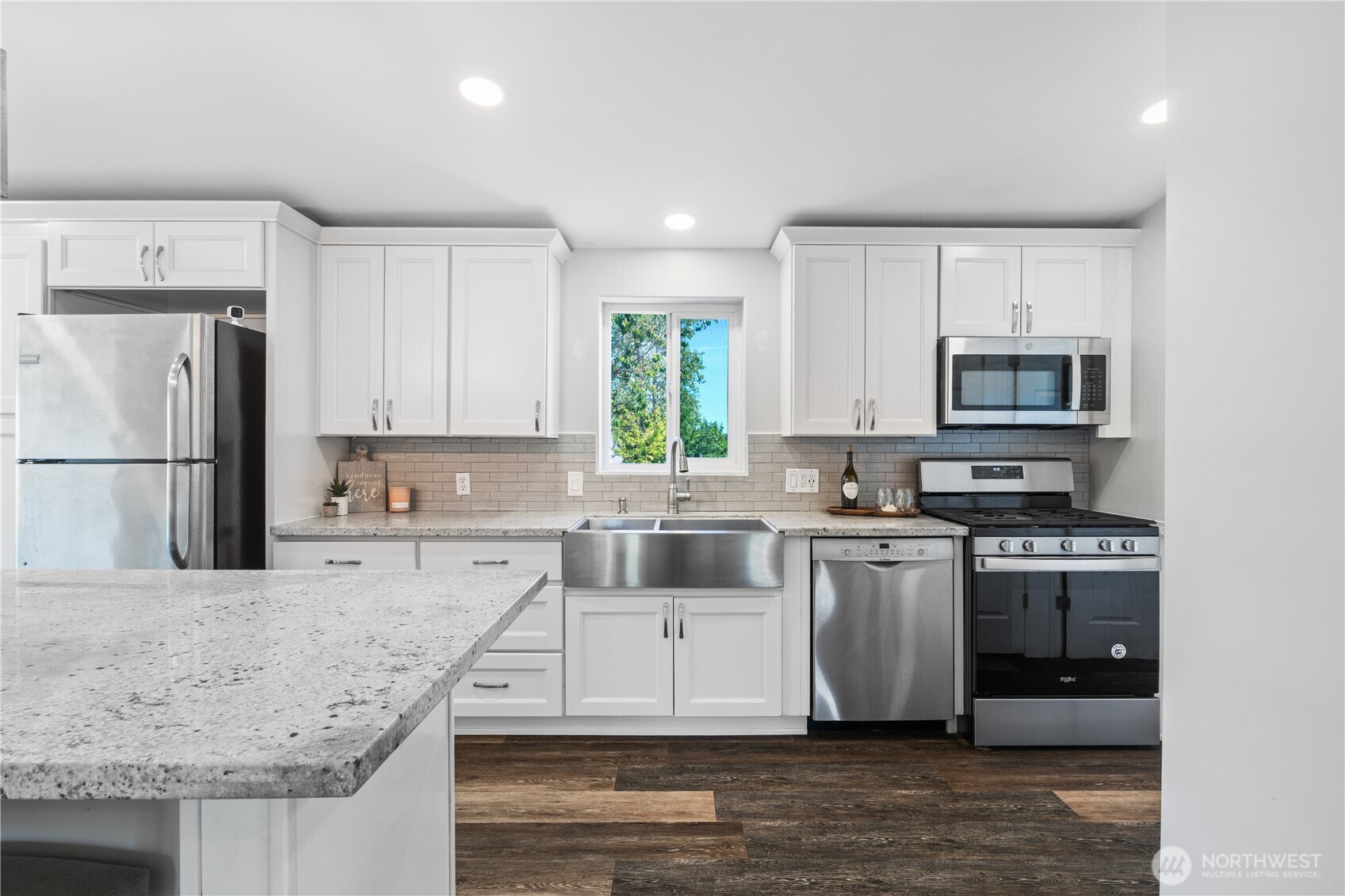 3471 Birch Bay Lynden Road Custer, WA 98240 - Photo 5 of 38 a kitchen with stainless steel appliances granite countertop a stove a sink and a refrigerator