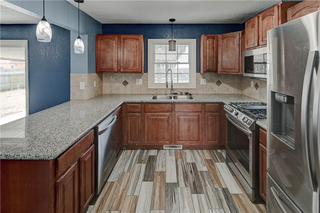 4116 South Delaware Avenue Independence, MO 64055 - Photo 6 of 40