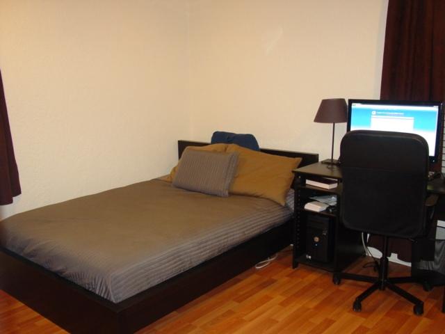 21338 Summertrace Circle Boca Raton, FL 33428 - Photo 16 of 22 a bed sitting in a bedroom next to a window