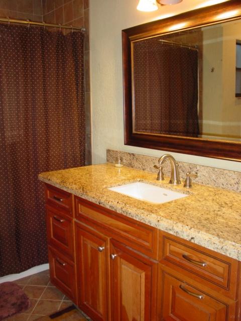 21338 Summertrace Circle Boca Raton, FL 33428 - Photo 18 of 22 a bathroom with a granite countertop sink and a mirror