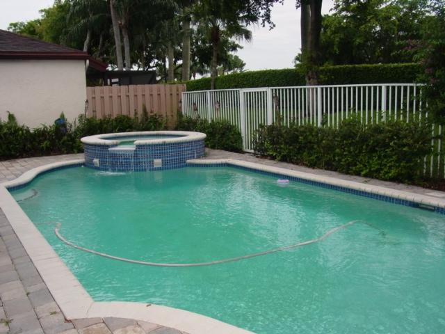 21338 Summertrace Circle Boca Raton, FL 33428 - Photo 2 of 22 a view of a backyard with plants