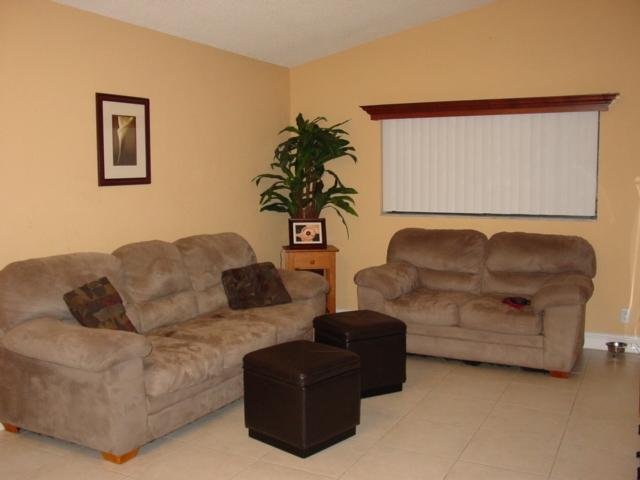 21338 Summertrace Circle Boca Raton, FL 33428 - Photo 7 of 22 a living room with furniture and a potted plant