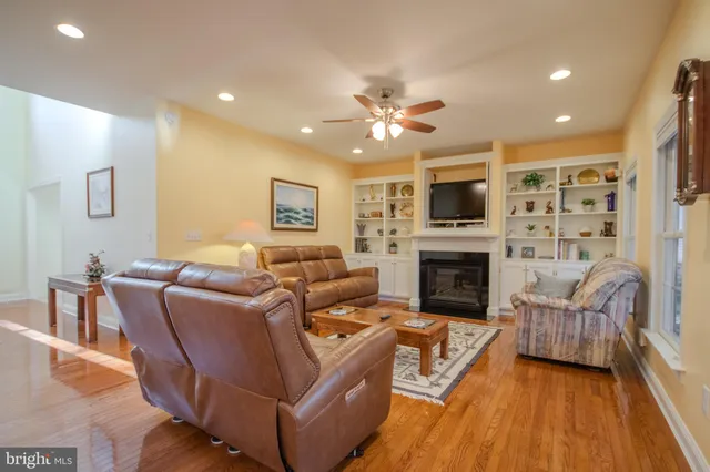 a kitchen with stainless steel appliances a sink stove and refrigerator