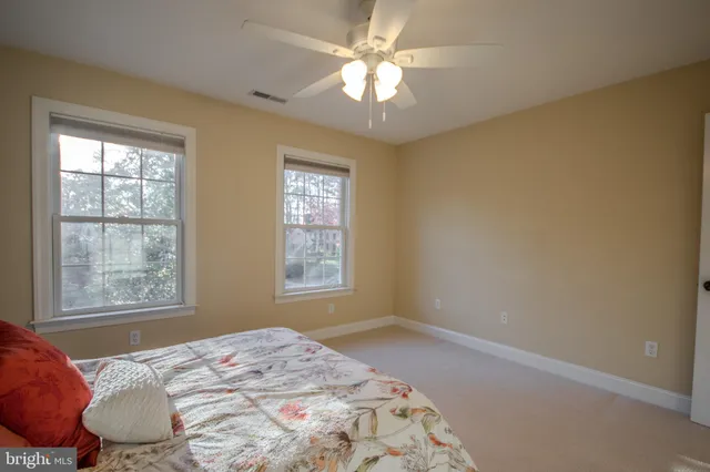 a view of a porch with furniture and yard