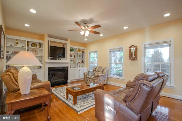 a kitchen with stainless steel appliances a refrigerator sink and microwave
