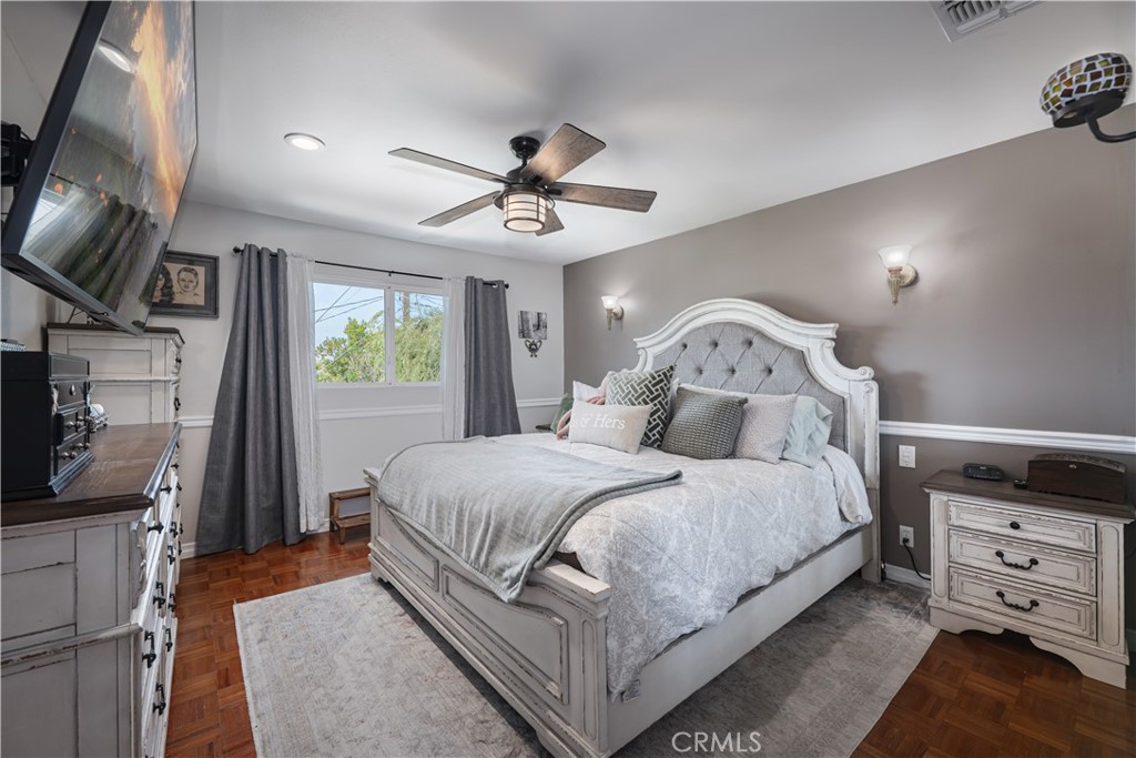 2203 Homewood Avenue Simi Valley, CA 93063 - Photo 27 of 37 a bedroom with a large bed and a tv