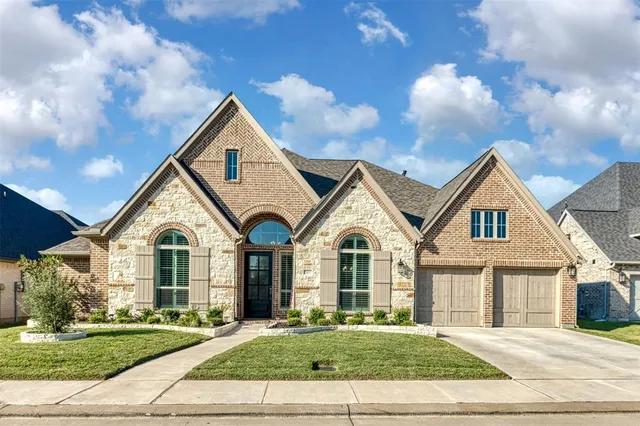 a view of house with yard and street view