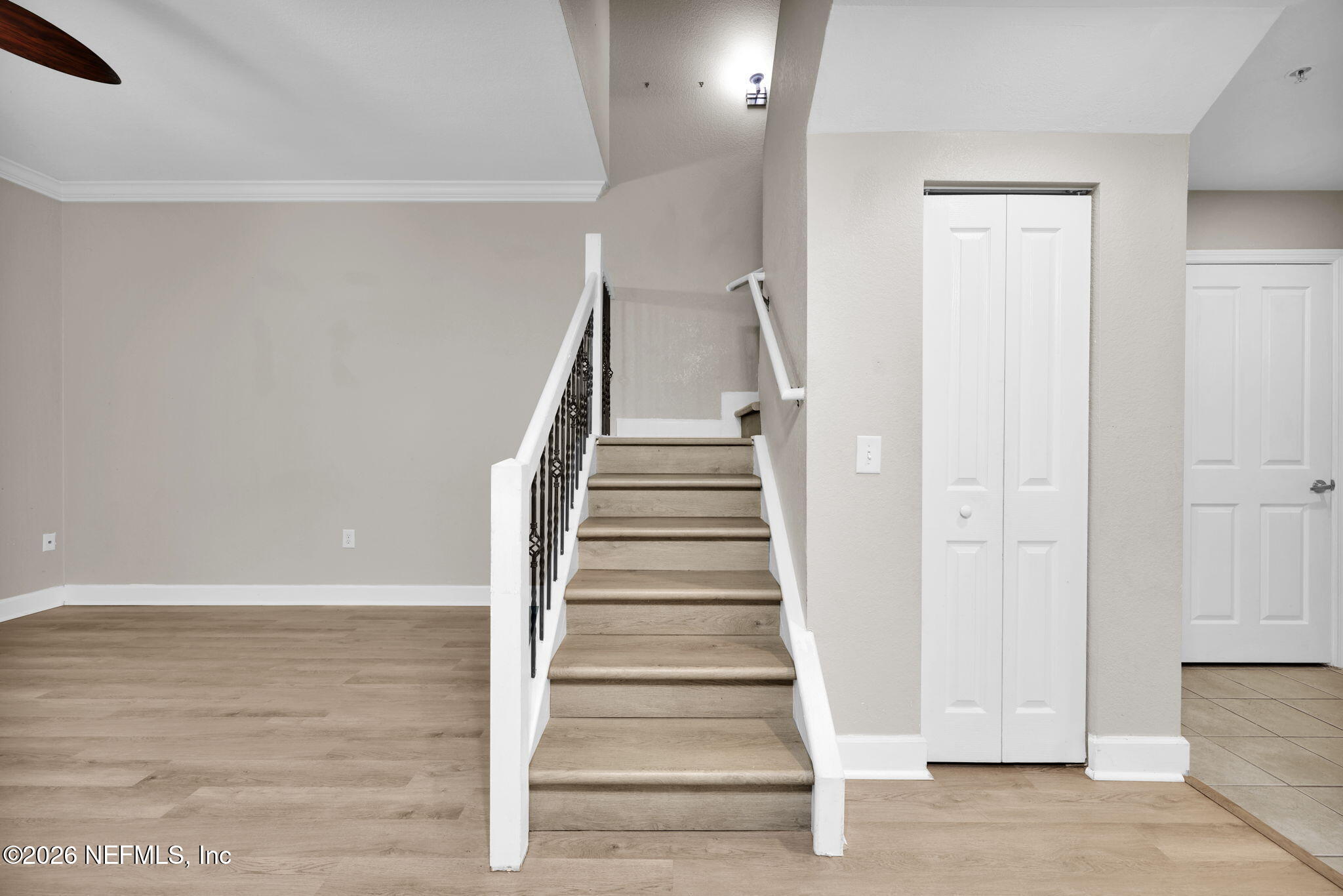 9745 Touchton Road, Unit 526 Jacksonville, FL 32246 - Photo 20 of 34 a view of entryway and hall with wooden floor