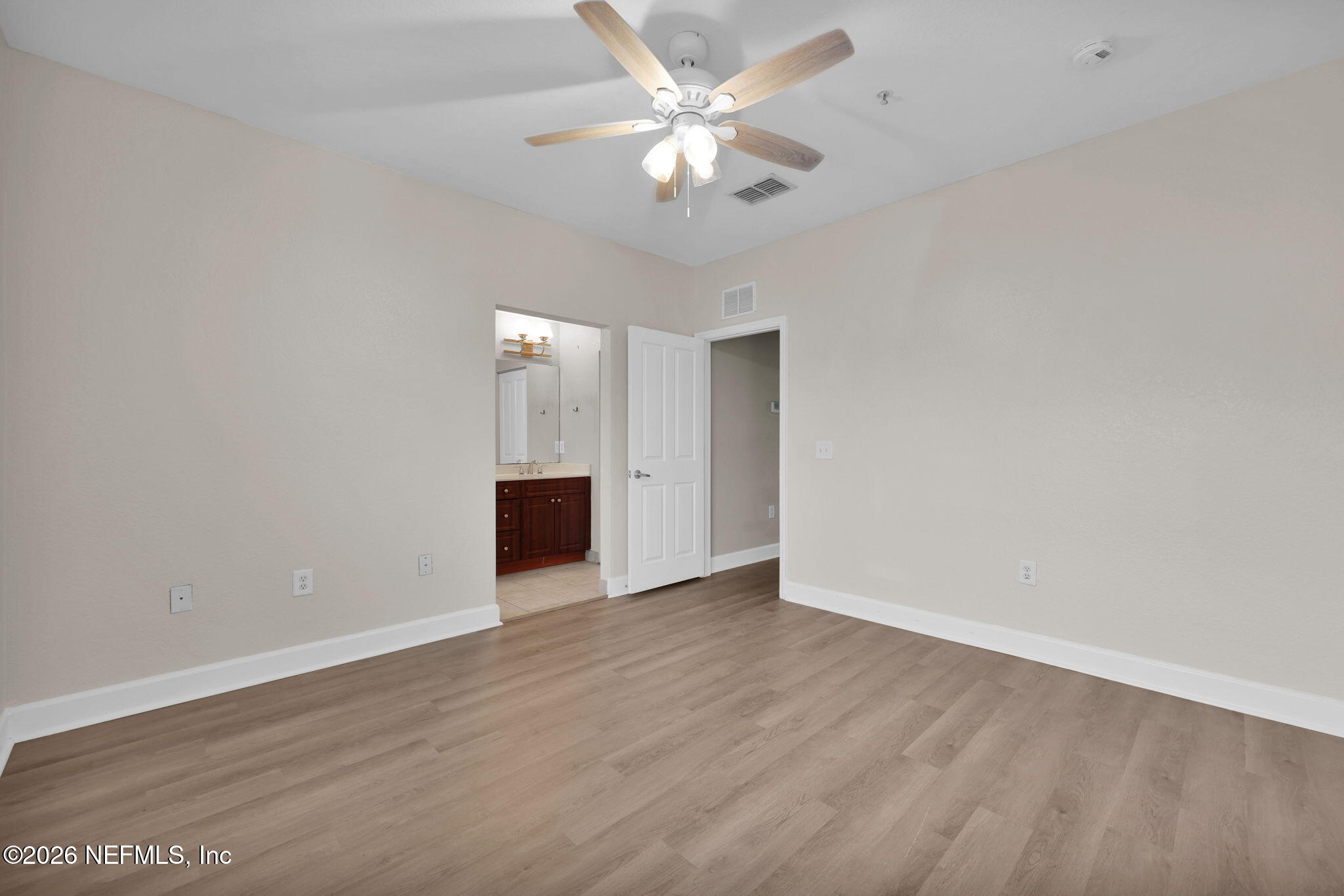 9745 Touchton Road, Unit 526 Jacksonville, FL 32246 - Photo 23 of 34 wooden floor in an empty room