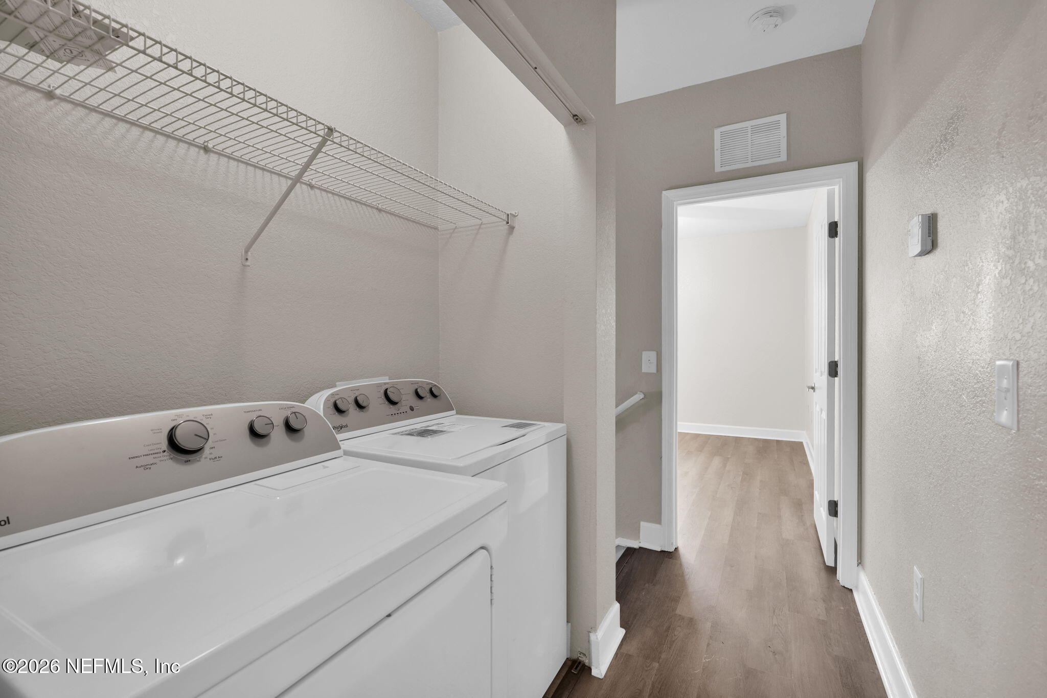 9745 Touchton Road, Unit 526 Jacksonville, FL 32246 - Photo 27 of 34 a view of utility room with washer and dryer